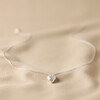 Full Length 3D Molten Heart Pendant Necklace in Silver on Beige Fabric