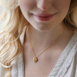 Model Wearing Lisa Angel Birthstone Heart Locket Necklace in Gold