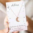 Model Holding Constellation Moon Necklace in Rose Gold on Jewellery Card