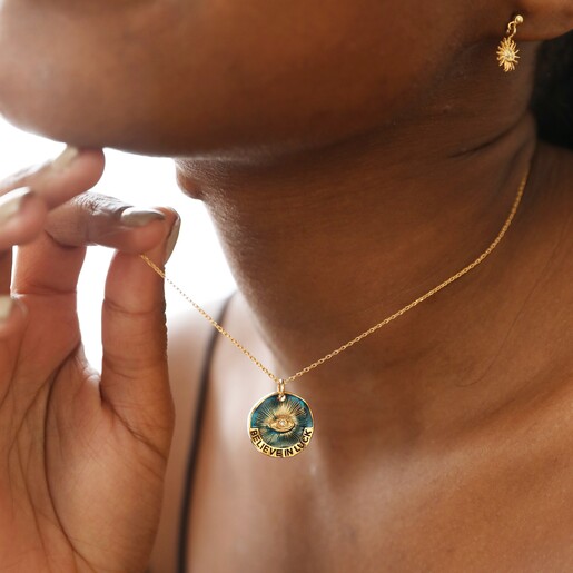 Close Up of Enamel Talisman Evil Eye Pendant Necklace in Gold on Model