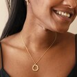 Floral Halo Pendant Necklace in Gold Worn by Model