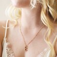 E Irregular Pearl Initial Necklace in Gold on Model
