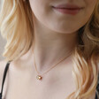 Model Wearing Moon Phase Enamel Pendant Necklace in Gold