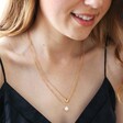 Model Wearing Pearl and Disc Layered Pendant Necklace in Gold