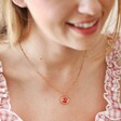 Model Wearing Gold June Rose Personalised Engraved Pressed Birth Flower Pendant Necklace