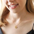 Model Wearing Pink Enamel Heart Pendant Necklace in Gold