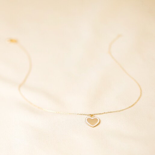 Pink Enamel Heart Pendant Necklace in Gold on Neutral Background