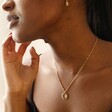 Model Wearing Sun and Moon Pendant Necklace in Gold 