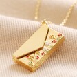 Wildflower Envelope Locket Pendant Necklace in Gold on Neutral Fabric