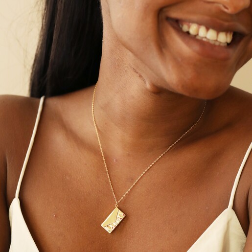 Model Wearing Wildflower Envelope Locket Pendant Necklace in Gold