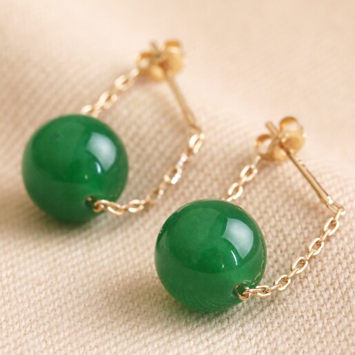 Green Agate Stone Bead Drop Earrings on Beige Fabric