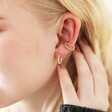 Model Wearing Layered Bubble Ear Cuff in Gold with Hoop