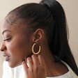 Organic Hammered Hoop Earrings in Gold on Model