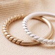 Close Up of Textured Silver and Gold Set of 4 Silver and Gold Stacking Rings 