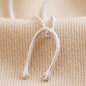 Slim Hug Hands Pendant Necklace in Silver