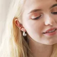 Model Wearing Textured Hoop Ear Cuff in Silver with Other Earrings