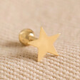 Tish Lyon Solid Gold Star Barbell on Beige Coloured Fabric