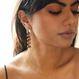 Model Wearing Big Metal London Brown Stone Cut Luxe Earrings in Gold