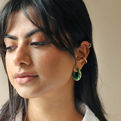 Model Wears Big Metal London Engraved Edge Green Enamel Hoop Earrings in Gold