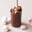 Gnaw Rocky Road Hot Chocolate Shot Out of Packaging Surrounded by Marshmallows