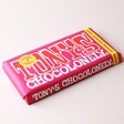 Tony's Chocolonely Milk Caramel Biscuit Chocolate Bar on Neutral Background