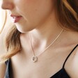 Sterling Silver Interlocking Crystal Rings Necklace on model
