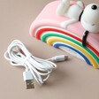 Birdseye View of House of Disaster Snoopy Rainbow LED Night Light Out of Packaging with USB Cable on Side