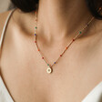 Estella Bartlett Crystal Rainbow Pendant Necklace in Gold on Model