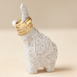 Speckled Ceramic Elephant Ring Holder with gold rings on neutral backdrop