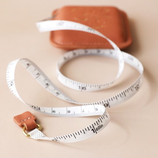 Close Up of Tape Inside Designworks Ink 'Measure Twice' Tape Measure