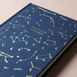 Front Cover of Designworks Ink Written In The Stars Notebook on Beige Background