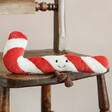 Jellycat Amuseable Candy Cane Soft Toy on Wooden Chair