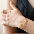 Gold Feather Bangle on Model