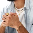 Men's Brushed Gold Stainless Steel Signet Ring on Model With Bracelet