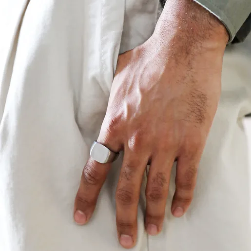 Model Wearing Men's Brushed Stainless Steel Signet Ring with Hand in Pocket