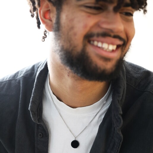 Smiling Model Wearing Men's Stainless Steel Black Onyx Stone Pendant Necklace