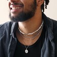 Male Model Weairng Herringbone Chain Necklace in Silver With Other Necklaces