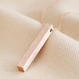 Bar Pendant Necklace in Rose Gold on Neutral Fabric