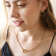 Model Wearing Gold Stainless Steel Figaro Chain Necklace
