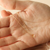 Semi-Precious Citrine Stone Teardrop Pendant Necklace in Goldin Model's Hands