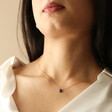 Semi-Precious Lapis Lazuli Stone Teardrop Pendant Necklace in Gold on Model in White Shirt