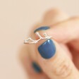 Model with Blue Nails Holding Adjustable Sterling Silver Constellation Ring