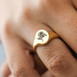 Close Up of Model Wearing Personalised October Birth Flower Adjustable Oval Signet Ring