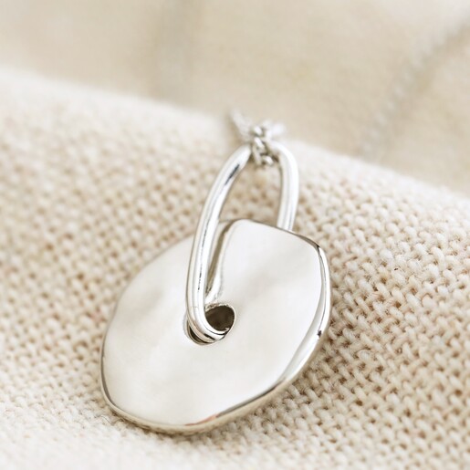 Close Up of Pendant on Spinning Disc Pendant Necklace in Platinum