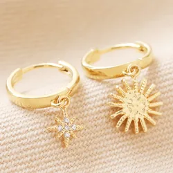 Sunburst and Star Charm Huggie Hoop Earrings in Gold