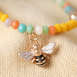 Close Up of Pendant on Colourful Beaded Bee Necklace in Rose Gold