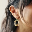 Close Up of Model Wearing Crystal Flower and Enamel Bee Drop Earrings