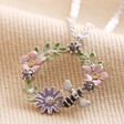 Crystal Flower and Enamel Bee Pendant Necklace in Silver on Beige Fabric