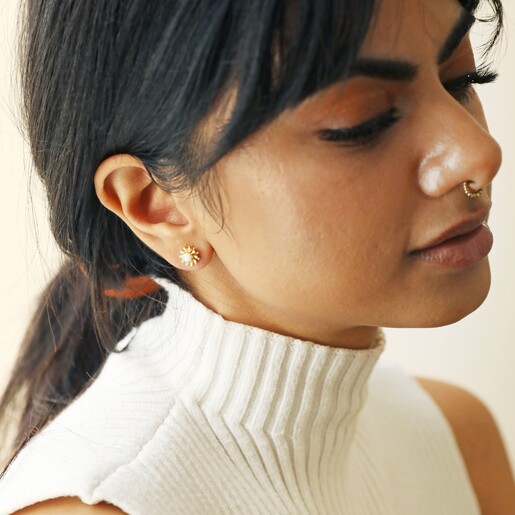 Earrings on Model Opal and Enamel Stud Earrings in Gold on Model