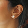 Close Up of Model Wearing Opal and Enamel Stud Earrings in Silver